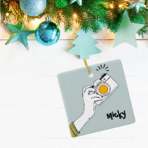 Handklick auf eine Kamera-Ornament im Cartoon