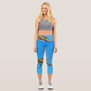 Hang auf die künstlerische Libelle gegen Cerulean Capri Leggings