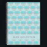 Hanukkah Menorah Blue Personalisiert Kids Name Notizblock<br><div class="desc">Dieses festliche Notizbuch zeichnet sich durch ein sich wiederholendes Menorah-Muster in hellblau und grau auf einem weichen himmelblauen Hintergrund aus, ideal um den Geist von Hanukkah zu feiern. Die Vorderseite bietet Platz für einen individuelle Name in sauberer, moderner Typografie. Ideal als Urlaubsgeschenk für Kinder, Schüler und Lieben, die während der...</div>