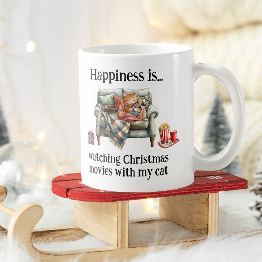 Happiness is watching Christmas movies with my cat Kaffeetasse