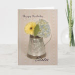 Happy Birthday Sister Karte<br><div class="desc">Eine Geburtstagskarte für Sister mit einer gelben Gerber-Daisy und blauen Hydrangea in einem Blechhaken und einem verblassten Hintergrund mit "Happy Birthday" oben und "Sister" im Script unten.</div>