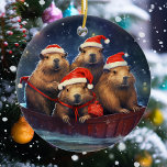 Happy Capybara Weihnachten Keramik Ornament<br><div class="desc">Dieses Design kann durch Auswahl der Option Design bearbeiten personalisiert werden. Sie können auch auf andere Gegenstände übertragen. Kontaktieren Sie mich unter colorflowcreations@gmail.com oder nutzen Sie die Chat-Option oben auf der Seite, wenn Sie dieses Design auf einem anderen Produkt haben möchten oder Hilfe benötigen. Sehen Sie mehr von meinen Designs...</div>