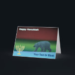 Happy Hanukkah - Polar Lights Polar Bear Feiertagskarte<br><div class="desc">Chanukkah Grüße aus dem Frozen Chosen. Ein Eisbär wandert in der langen Polarnacht durch das Eis; die Nordlichter in rot und grün leuchten in der Ferne. Eine Chanukkah menorah erscheint zusammen mit Text lesen,  "Happy Hanukkah". Fügen Sie Ihren eigenen zusätzlichen Text hinzu.</div>