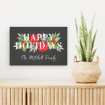 Happy Holidays Gray Christmas Floral Familienname Leinwanddruck<br><div class="desc">Die moderne Blumentypografie der Weihnachtsstunde ist mit dem Wortlaut "Happy Holidays" gerahmt, der von einem eleganten, blumengeschmückten und grünen Aquarell-Design im Winter geprägt ist. Umfasst heilige Blätter und Beeren, Poinsettia-Blume und grüne Zweige. Personalisieren Sie den Skripttext mit dem Nachnamen Ihrer Familie oder einem anderen benutzerdefinierten Text. Dunkelkohlegrauer Hintergrund mit roten,...</div>
