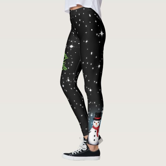 Happy Holidays in Green Text mit Snowman auf BLACK Leggings (Links)