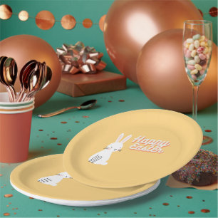 Happy Ostertext mit sonniger Orange Pappteller