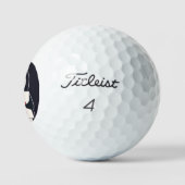 Happy penguin holding a sign to personalize golfball (Logo)