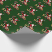 Happy Santa Claus Reiten auf dem farbenfrohen Cham Geschenkpapier (Ecke)