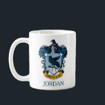 Harry Potter | Gothic Ravenclaw Wappen Kaffeetasse<br><div class="desc">Die Vintage Stylesgrafik ist ein perfekter Begleiter für die Fans der schlagenden Harry Potter-Serie. Das Ravenclaw-Wappen wird durch den weisen Rabe und den blauen gotischen Hintergrund unterstrichen. In Ravenclaw sind nur die cleversten Hexen und Zauberer untergebracht. Dieses Design bietet die perfekte Gelegenheit, der Welt zu zeigen, zu welchem Hogwarts Haus...</div>