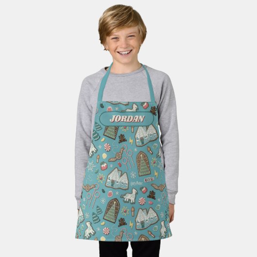 HARRY POTTER™ HOGWARTS™ Weihnachtskochtmuster Schürze (Getragen)