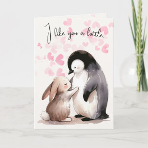 Hase und Pinguin umarmen sich freundschaftlich Karte