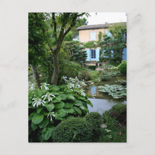 Haus in einem schönen Garten Postkarte 1