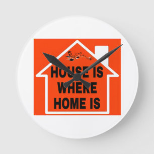 HAUS IST WO HEIM IST LOGO SCHWARZE SCHRIFT ORANGEF RUNDE WANDUHR
