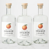 Hausgemachte Orangenliköre mit Orange Alkoholflaschenetikett (Flaschen)