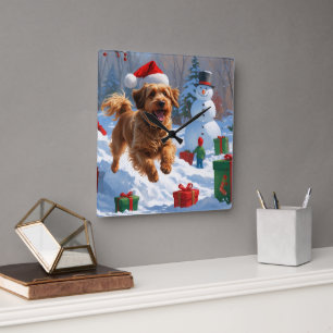Havanese läuft im Schnee mit Weihnachtsmütze Quadratische Wanduhr