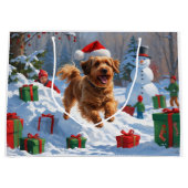 Havanese läuft in Schnee mit Weihnachtshut Große Geschenktüte (Vorderseite)