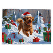 Havanese läuft in Schnee mit Weihnachtshut Große Geschenktüte (Rückseite)