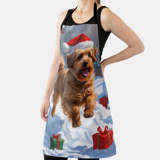 Havanese läuft in Schnee mit Weihnachtshut Schürze (InSitu)