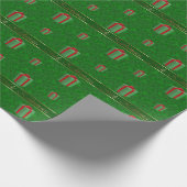 Hawaiisches Weihnachtsgeschenk verpackt grünes Geschenkpapier (Ecke)