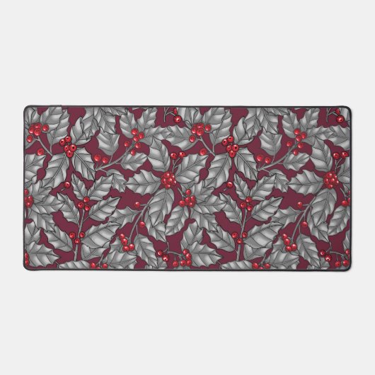 Heilige Beere, graue Blätter auf dunkelrot Schreibtischunterlage (Vorderseite)