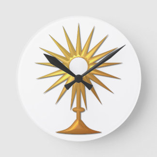 Heiliger Eucharist in der goldenen Monstrance Runde Wanduhr