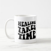 Heilung braucht Zeit Tasse (Links)