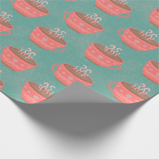 Heiße Schokolade Weihnachtsbecher auf grün Geschenkpapier (Ecke)