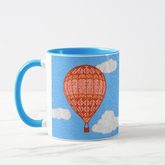 Heißluftballon, Korallenorange gegen einen blauen Tasse (Links)