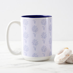 Hellblau umrandetes Blumenmuster Zweifarbige Tasse