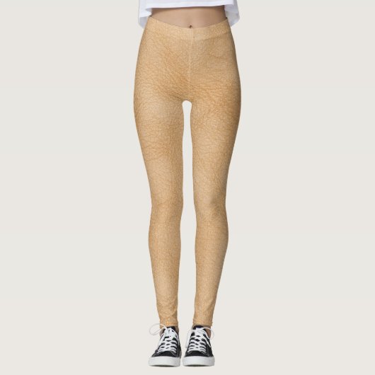 Hellbrauner Hintergrund mit Lederstruktur. Leggings (Vorderseite)