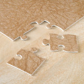 Hellbrauner Hintergrund mit Lederstruktur. Puzzle (Seite)