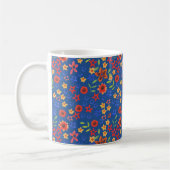 Helle Blumenminiprint auf Blue Coffee Tasse (Links)
