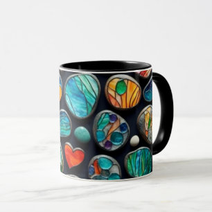 Helle dekorative gestrichene Steine Tasse