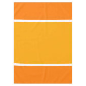 Helle, helle, goldgelbe, weiße Streifen auf orange Tischdecke (Vorderseite)
