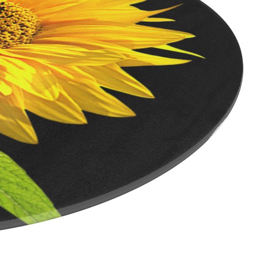 Helle Sonnenblume auf schwarzem Hintergrund Schneidebrett (Ecke)