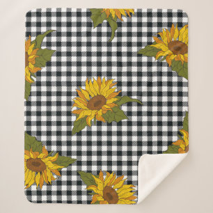 Helle Sonnenblumen auf einem schwarz-weißen Büffel Sherpadecke