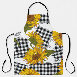 Helle Sonnenblumen-Blume auf karierten Pflastern. Schürze