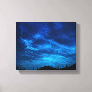 HELLE STERNE IN EINEM DUNKEN UND BLAUEN HIMMEL LEINWANDDRUCK