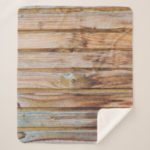 Helle Vintage Holzplanken im Hintergrund. Hori Sherpadecke