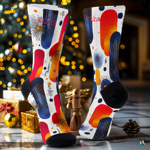 Helle Weihnachten mit roten, blauen und goldenen S Socken