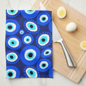 Helles griechisches Augenmuster auf dem blaublauen Geschirrtuch (Viertel Falte)