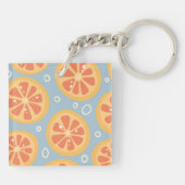 Helles und feines Orangenmuster auf blau Schlüsselanhänger (Rückseite)