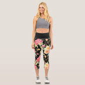Helles und fröhliches Blume-Muster auf schwarz Capri Leggings (Vorderseite)