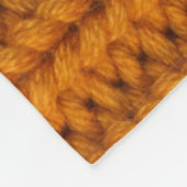 Hellgelb: handgefertigte Stricktextur. Fleecedecke (Ecke)
