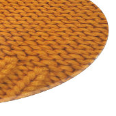 Hellgelb: handgefertigte Stricktextur. Schneidebrett (Ecke)