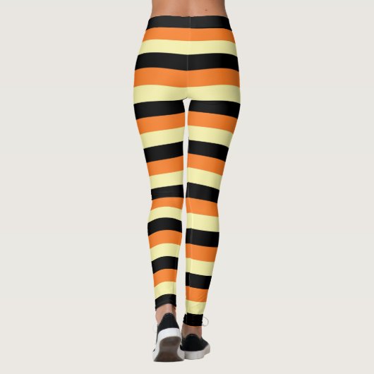 Hellgelbe, schwarze und orange Streifen Leggings (Rückseite)
