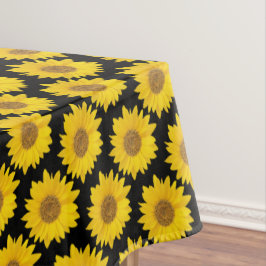 Hellgelbe Sonnenblumen auf schwarz Tischdecke