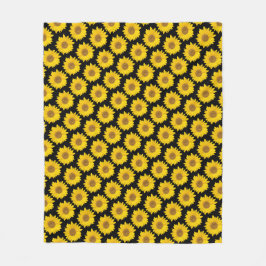 Hellgelbe Sonnenblumen auf schwarzem Hintergrund Fleecedecke