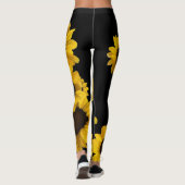 Hellgelbe Sonnenblumen auf schwarzem Hintergrund Leggings (Rückseite)