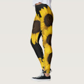 Hellgelbe Sonnenblumen auf schwarzem Hintergrund Leggings (Links)